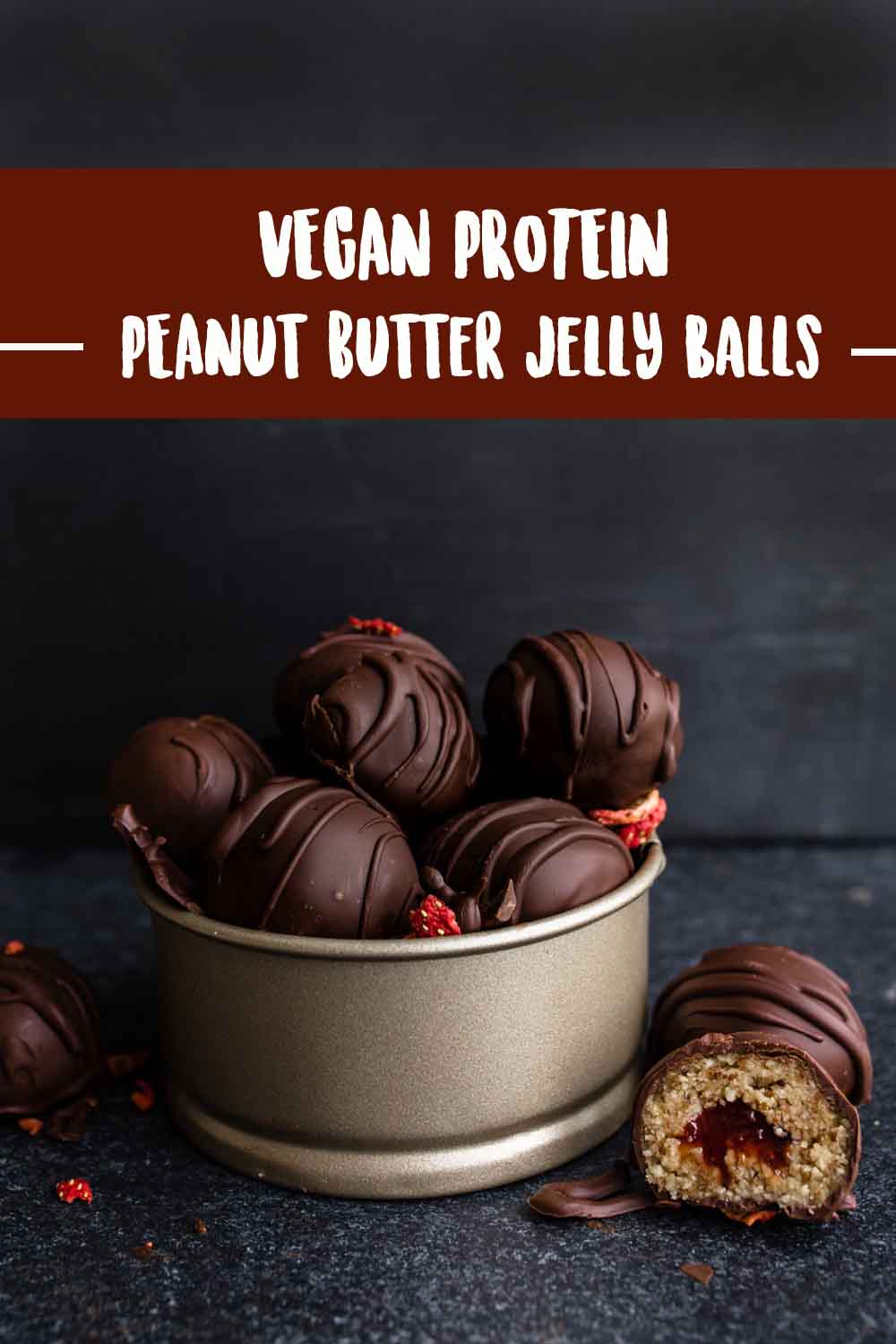 Protein Peanut Butter Jelly Balls covered in dark chocolate